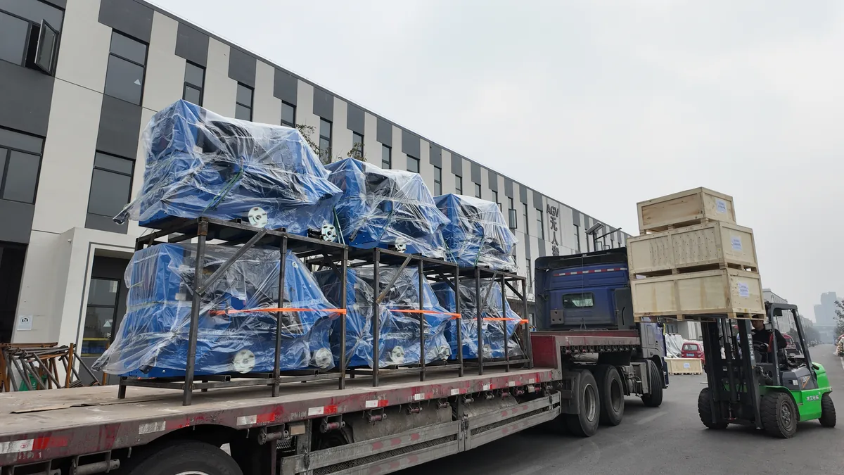 KORVA C1200 compact tracked loader container loading for international shipment