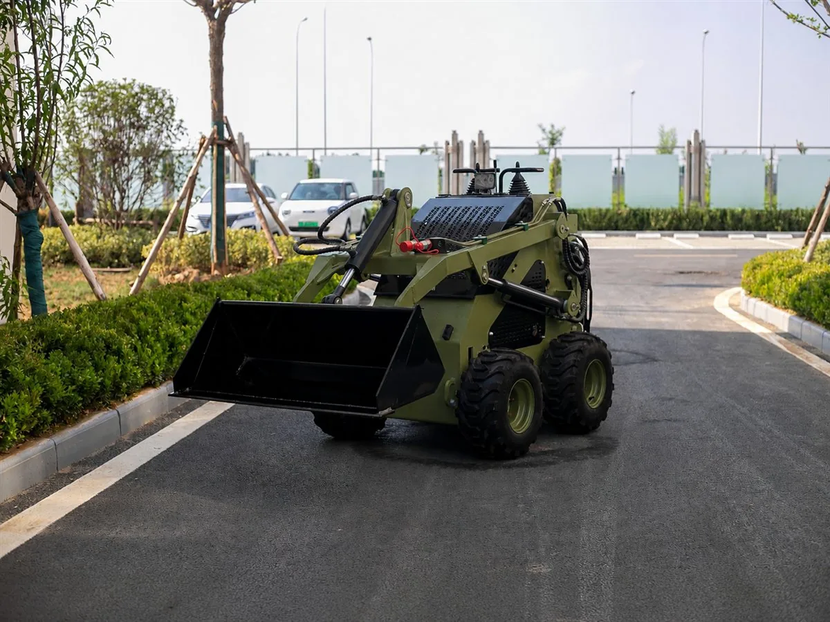 Army green customized KORVA S360 mini skid steer loader with bucket