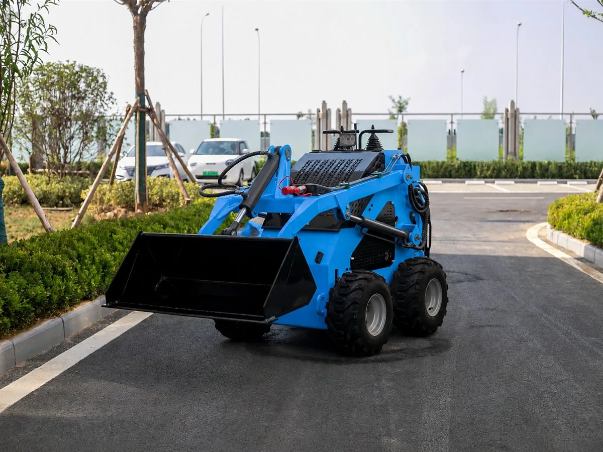 Blue customized KORVA S360 mini skid steer loader with bucket
