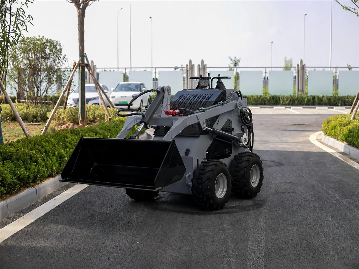 Graphite gray customized KORVA S360 mini skid steer loader with bucket