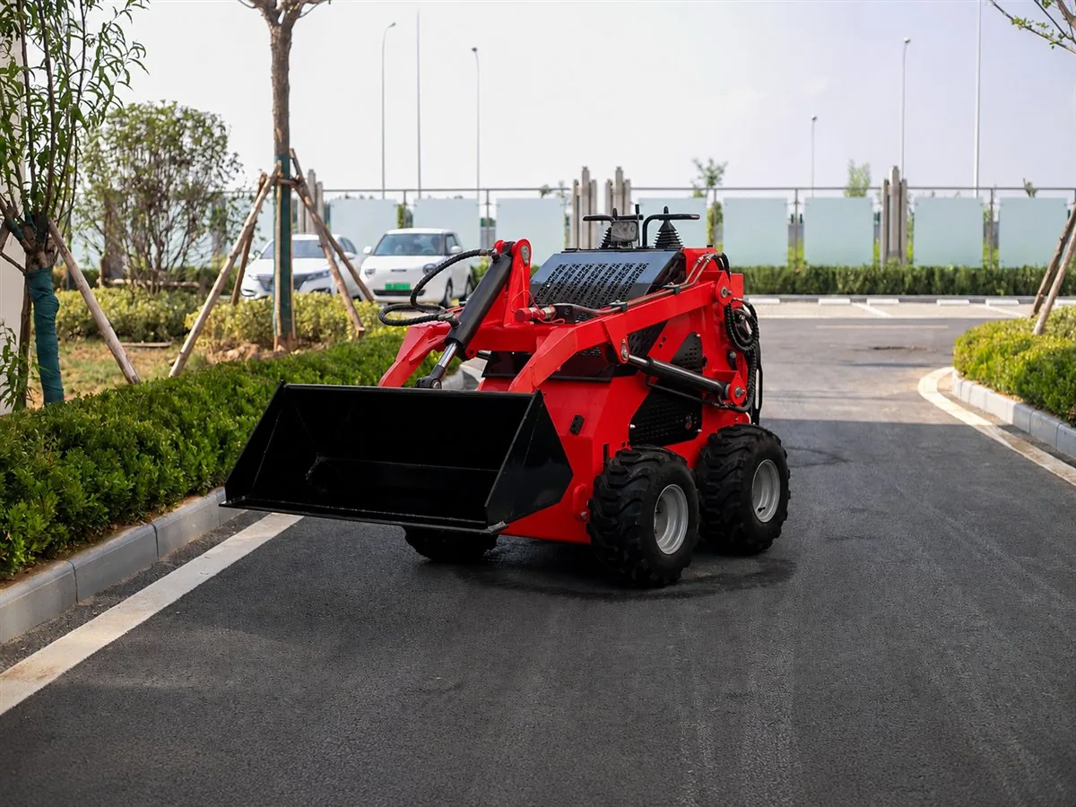 Red customized KORVA S360 mini skid steer loader with bucket