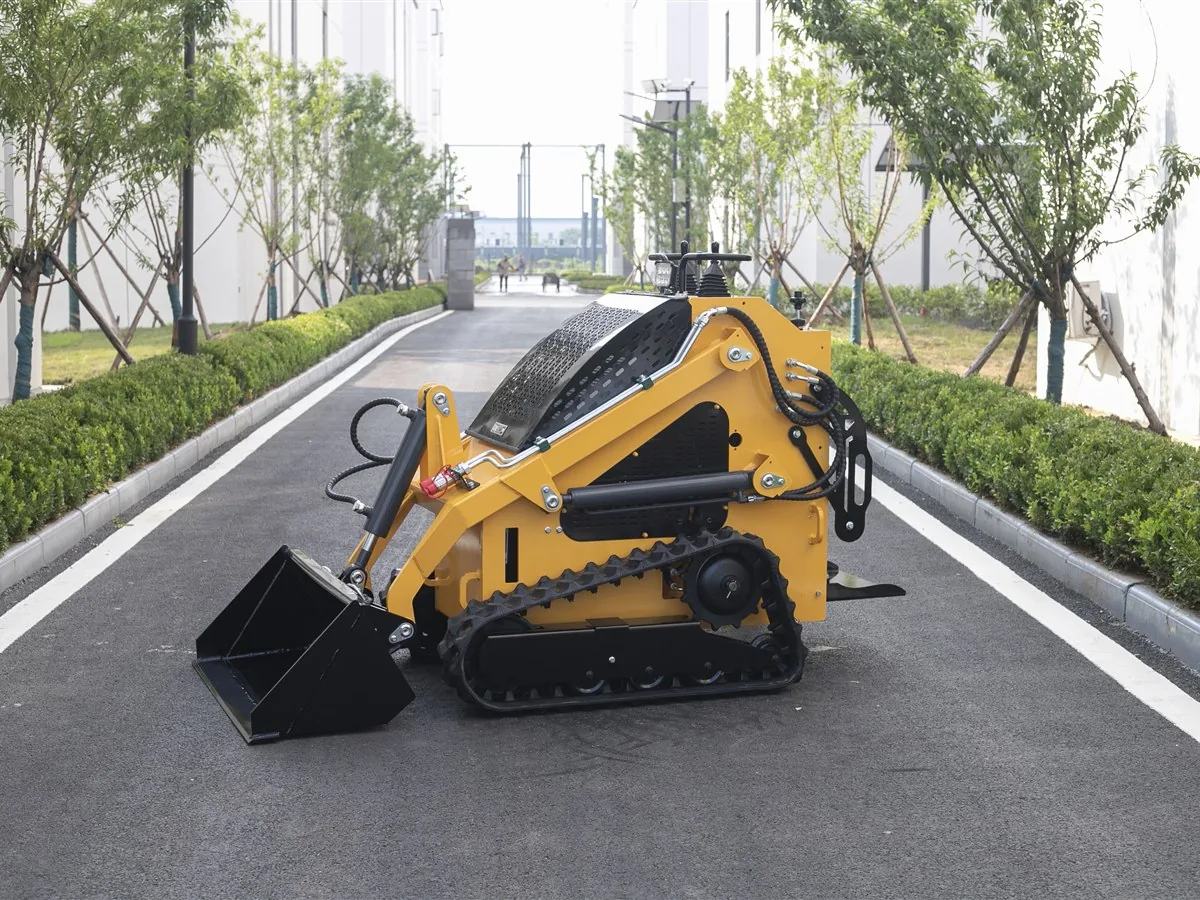 KORVA T360 tracked mini skid steer loader side view with rubber tracks