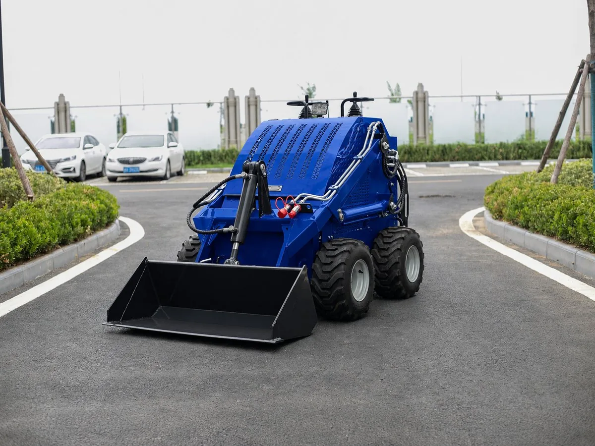 Blue customized KORVA S460 wheel mini skid steer loader for rental fleets