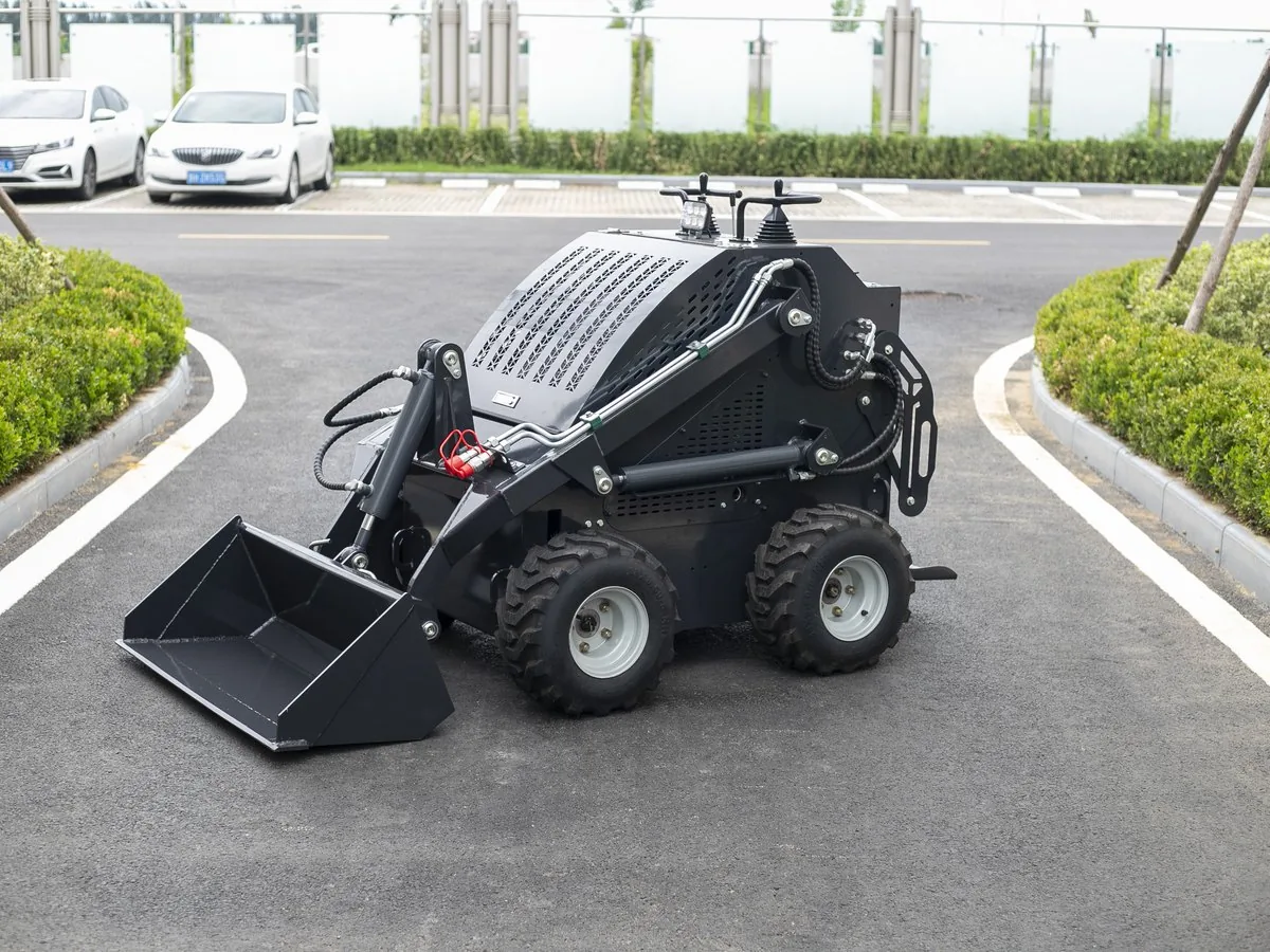 KORVA S460 mini skid steer loader front angle with general purpose bucket