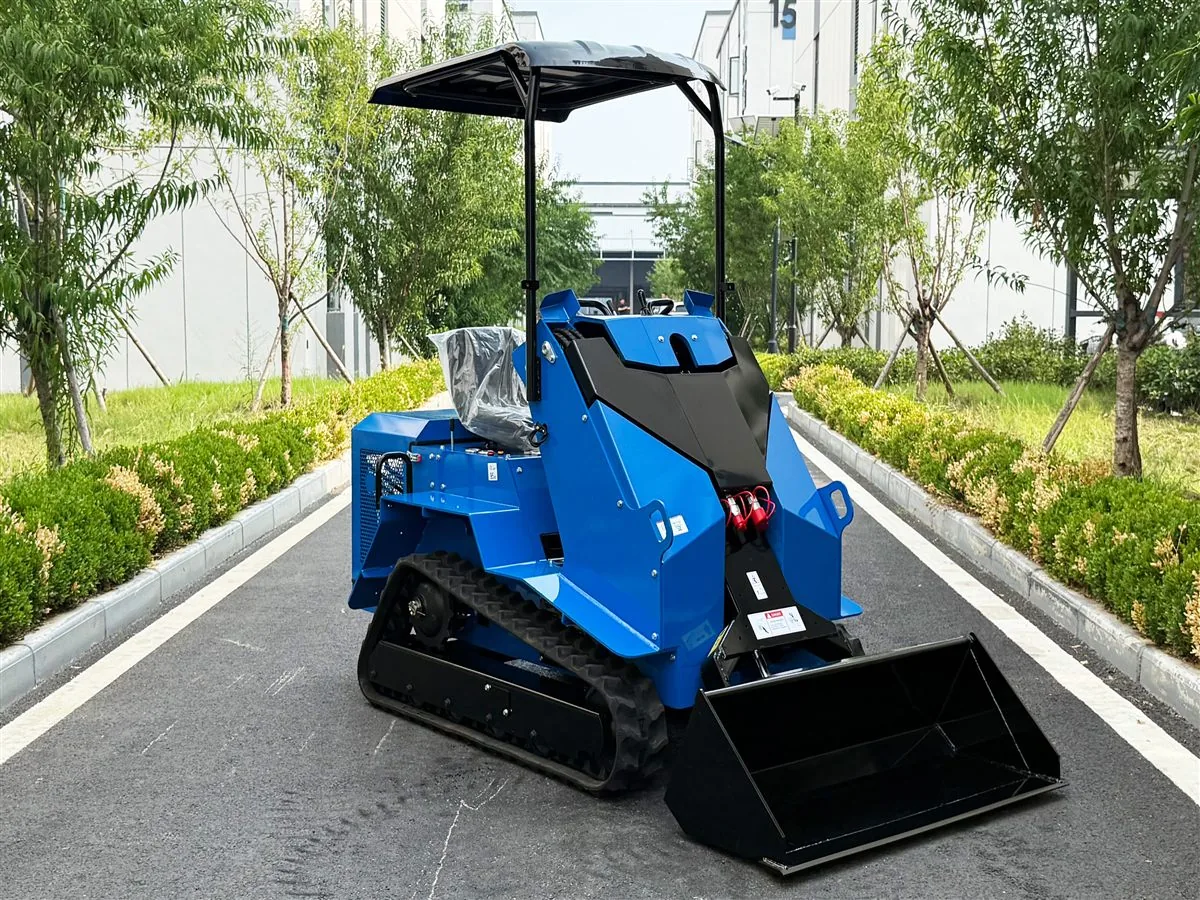Blue KORVA T490 tracked ride-on mini skid steer loader comparison view