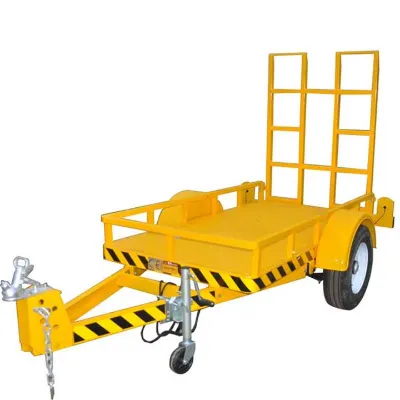 Small trailer for mini excavator attachment and material transport