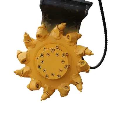 Milling head attachment for compact excavator road maintenance