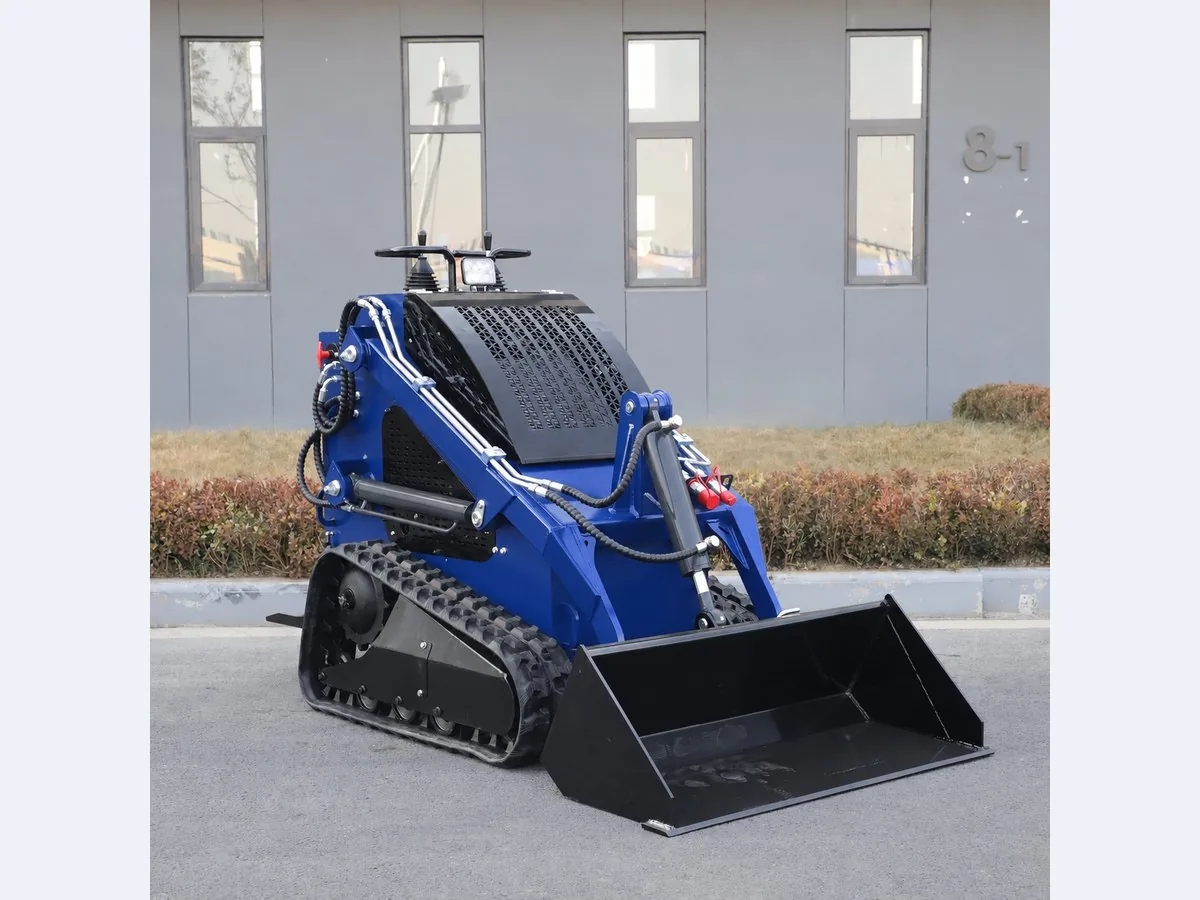 Blue customized KORVA T360 tracked mini skid steer loader for narrow spaces