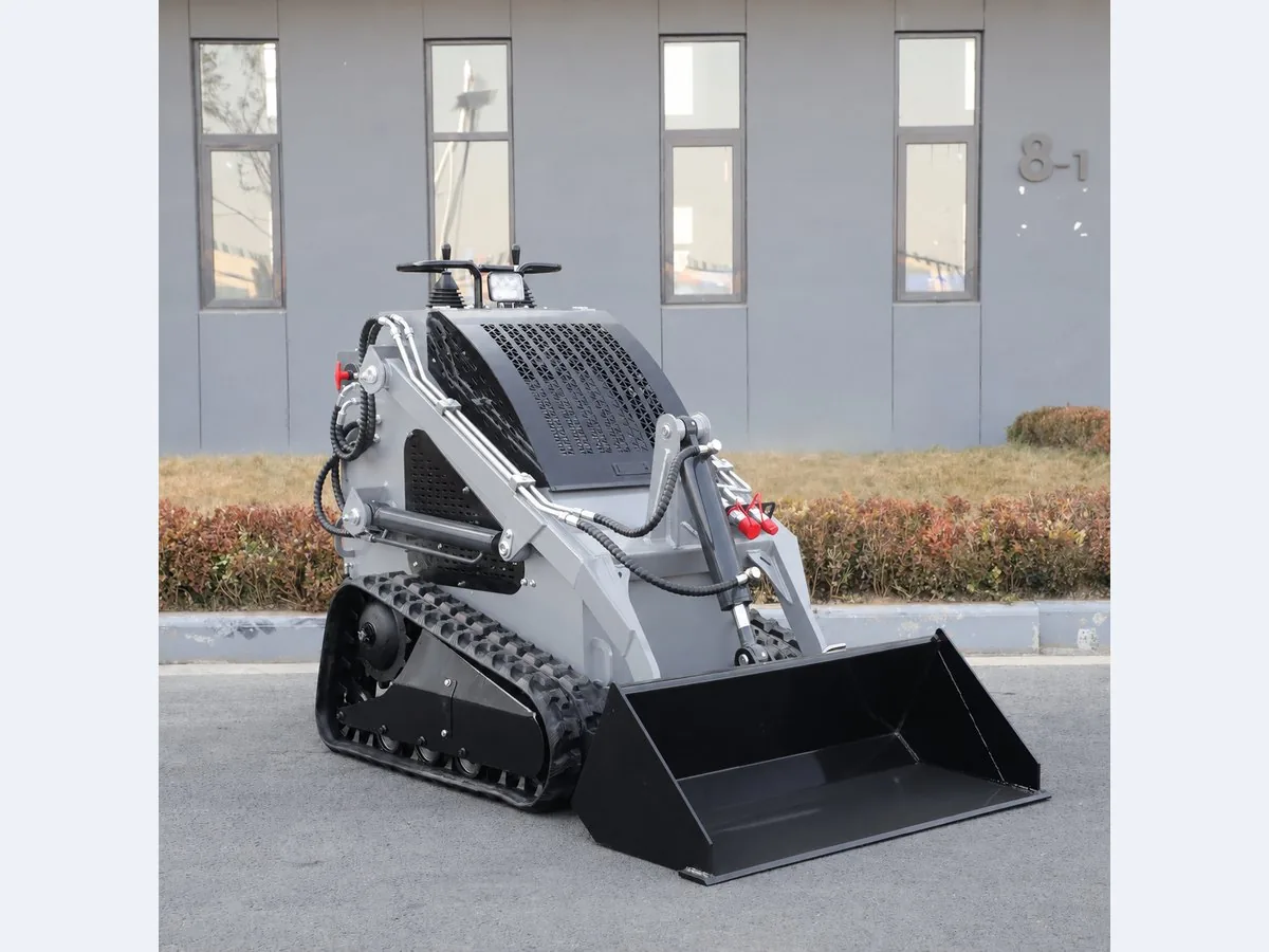 Gray customized KORVA T360 tracked mini skid steer loader for material handling