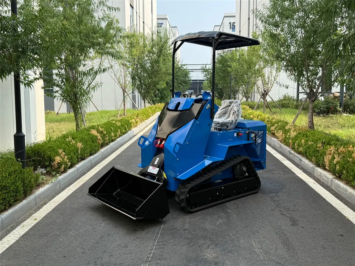 KORVA T490 ride-on tracked loader side view at a construction site