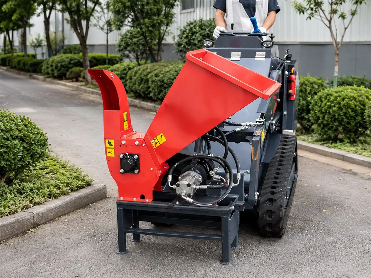 Mini skid steer wood chipper attachment for branches and landscaping cleanup
